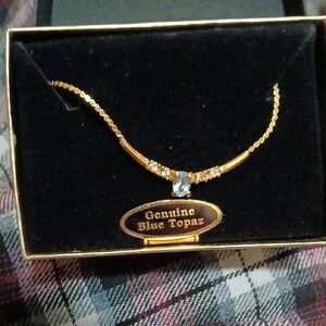 Gold Necklace with Blue Topaz Accent